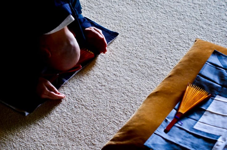 Zen monk bowing.