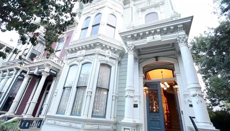 The front of a Victorian house.